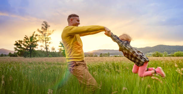 istock Father having fun with his daughter outdoors 1313992055