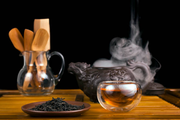 istock Clay teapot with smoked red tea Lapsang souchong 1313992073