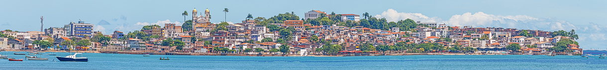 Panoramic view of the old town of Salvador de Bahia from the opposite coastline during daytime