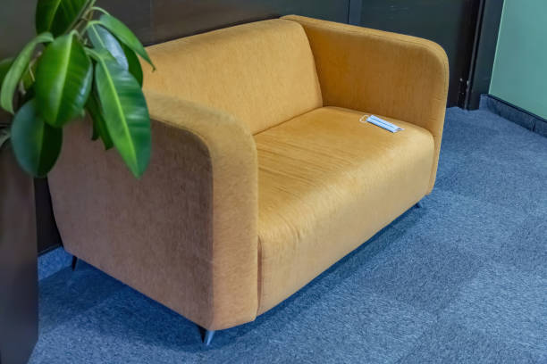 istock Soft orange sofa for home, office or hotel 1313998377