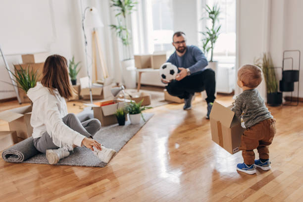 istock Couple with son in their new apartment 1313998436