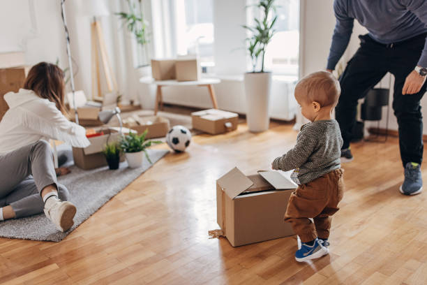 istock Couple with son in their new home 1313998469