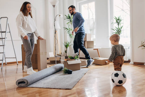 istock Couple and their son in new house 1313998501