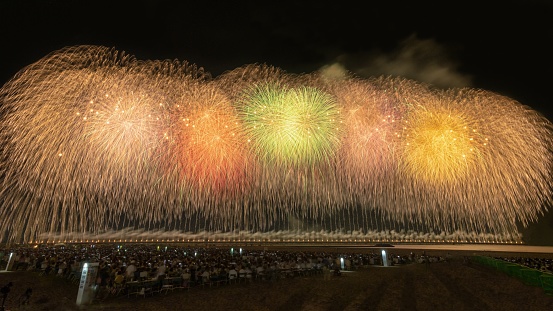 This is the photograph of the fireworks festival of Gion Kashiwazaki festival in Niigata prefecture, Japan.\nThis fireworks festival is one of the three major fireworks festivals in Echigo.\nThis festival will be held every July at the shore near Kashiawazaki city center.