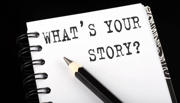 istock WHAT'S YOUR STORY written text in a small notebook on a black background 1313998940