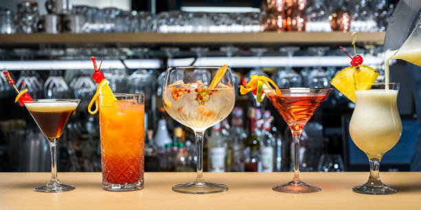 istock Pouring cocktail into glass 1313999171