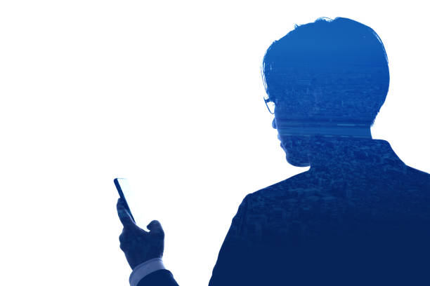 istock Double Exposure businessman use mobile phone and skyscraper building city isolate on white background. 1314000425