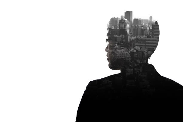 istock Double Exposure thinking businessman and skyscraper building city with white background. 1314000432