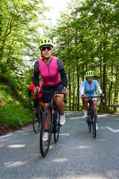 istock Female friends cycling 1314003125