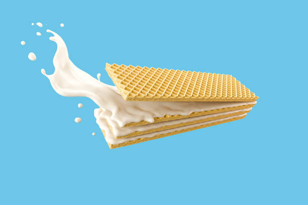 istock Milk wafer sticks Isolated on Blue background 1314004421