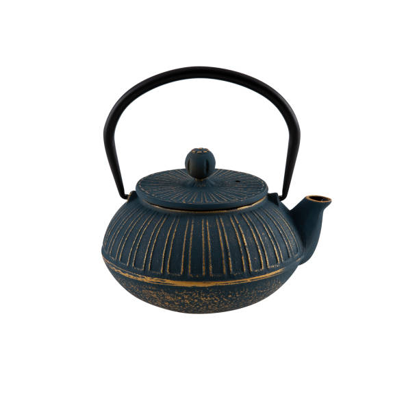 istock Black cast iron teapot isolated on reflective white background 1314005416