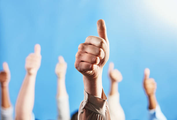 istock Many hands giving the thumbs-up sign 1314006645