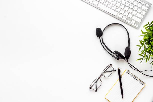istock Headset on computer laptop. Equipment for pc call center support 1314006775