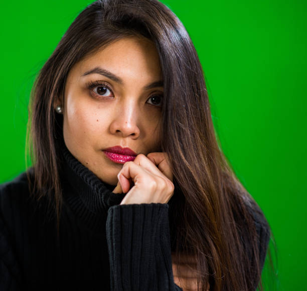 istock Young pretty woman posing for the camera in a studio 1314007073