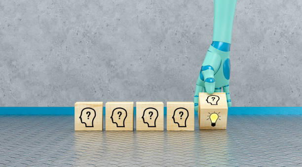 istock robot hand turning cube with person symbol to find an idea  - 3d illustration 1314007328