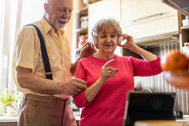 istock Happy senior couple using digital tablet at home 1314007329