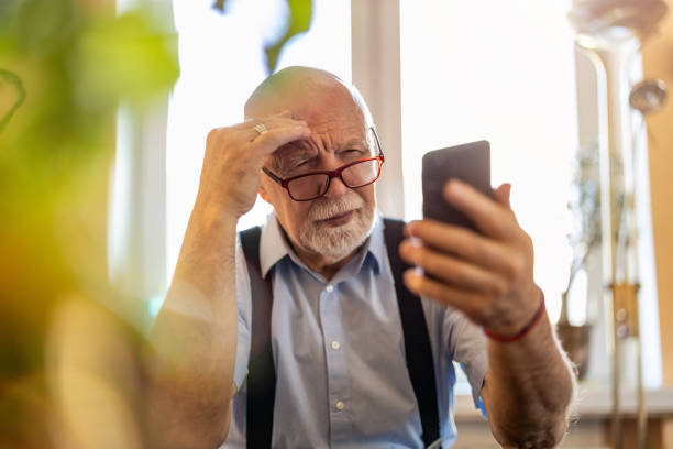 istock Senior man staring at his smartphone in confusion 1314008053