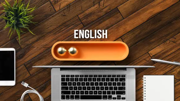 Photo of stylized loading bar with the word ENGLISH and office equipment