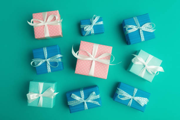 istock Flat lay of various gift boxes over green background 1314013318