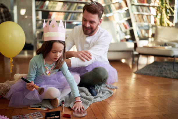 istock Lovely father and daughter playing together 1314015720