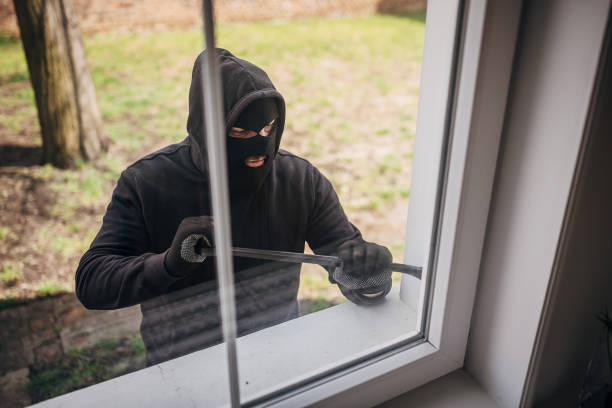 istock Robber trying to brake in house 1314019237