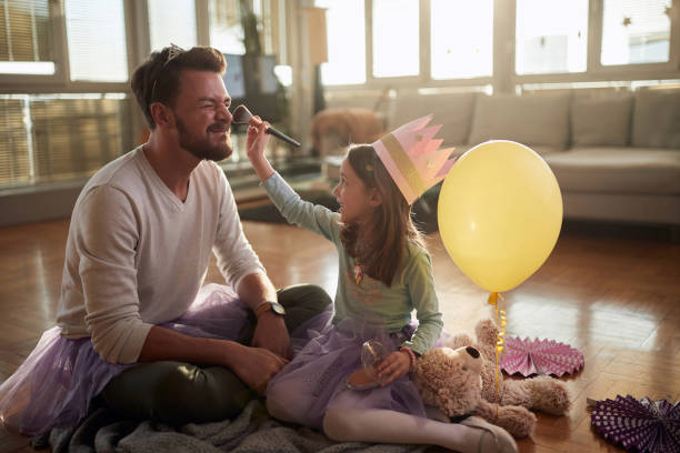 istock Adorable father and daughter playing together 1314020352