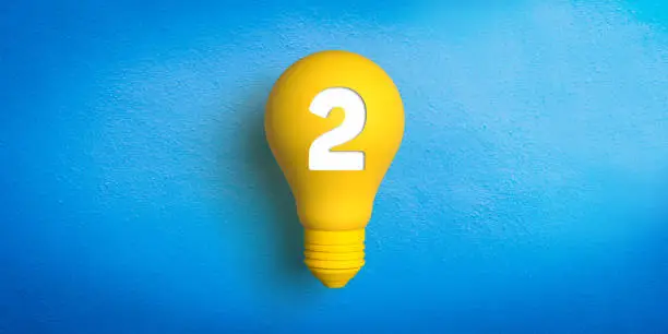 Ideas and innovation concept: 3D rendered retro type yellow light bulb on blue background. White number series. Trendy minimalist design in illustration form