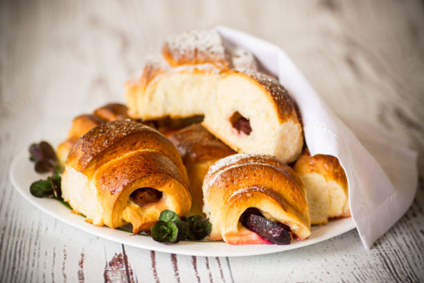 istock baked sweet homemade buns with plum inside 1314026763