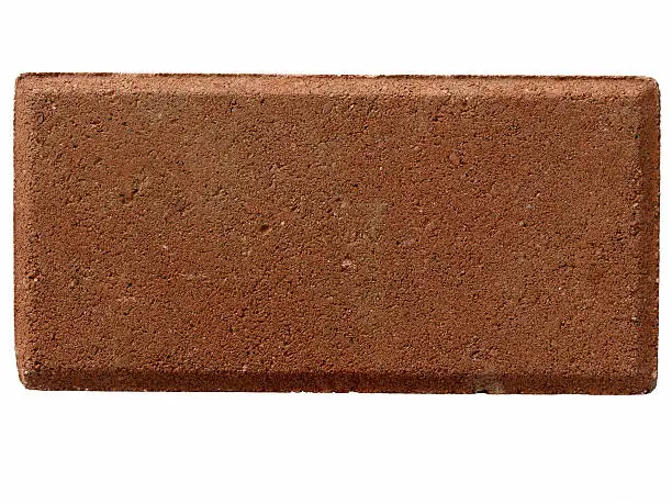 Straight on macro closeup shot of a solitary red brick used in construction and home building.  On white background.  No mortar.