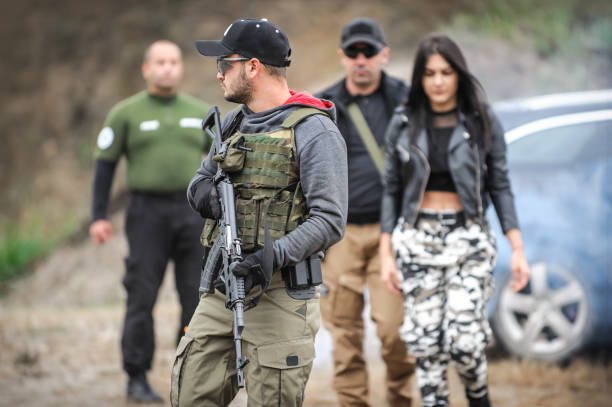 istock Bodyguard and VIP people security protection. Combat gun shooting training 1314034406