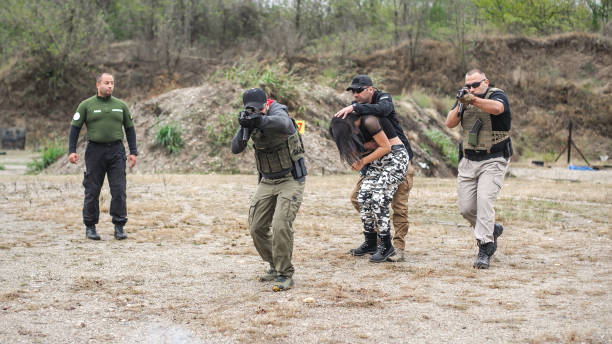 istock Bodyguard and VIP people security protection. Combat gun shooting training 1314034435