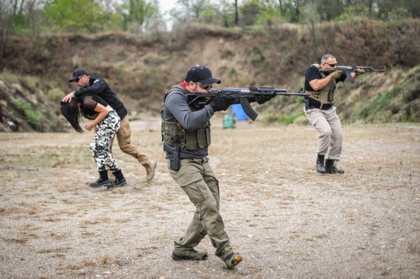 istock Bodyguard and VIP people security protection. Combat gun shooting training 1314034463