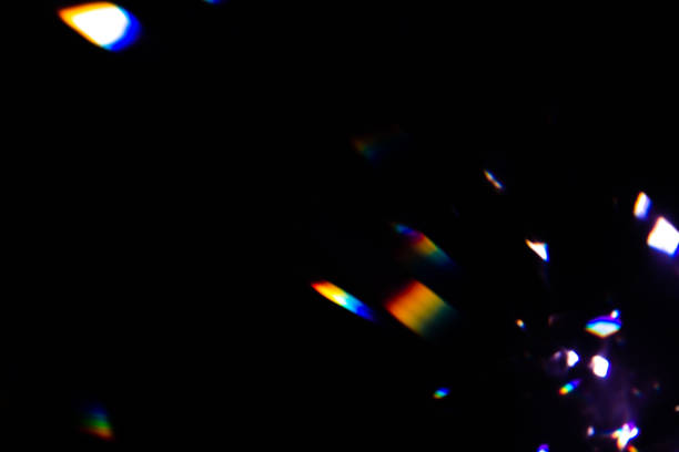 istock colorful warm rainbow crystal light leaks on black background 1314034476