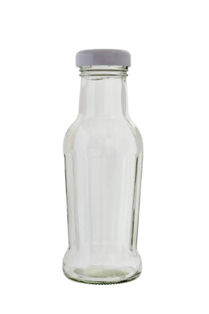 istock Glass bottle with a metal lid. Isolated on a white background. 1314036548