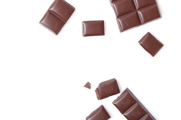 istock pieces of chocolate isolated on white. 1314037836