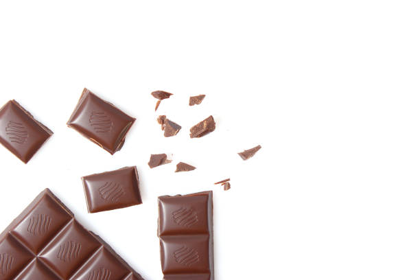 istock pieces of chocolate isolated on white. 1314037881