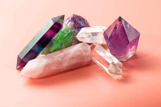 istock Various crystals for healing and magical practices. Faceted amethyst, rose quartz, fluorite, rock crystal, quartz cluster on pastel background 1314038144