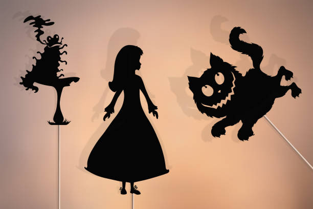 istock Alice in Wonderland storytelling, fairytale shadow puppets 1314038892