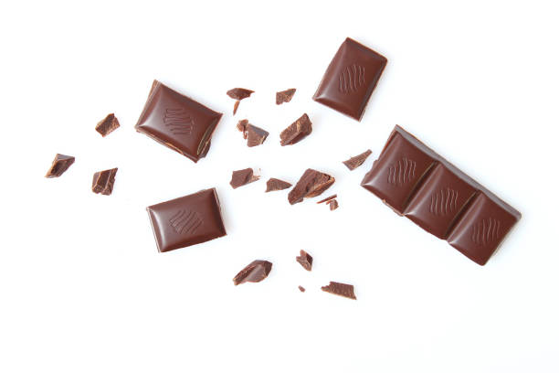 istock pieces of chocolate isolated on white. 1314039147