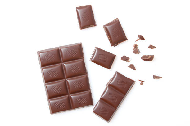 istock pieces of chocolate isolated on white. 1314039241