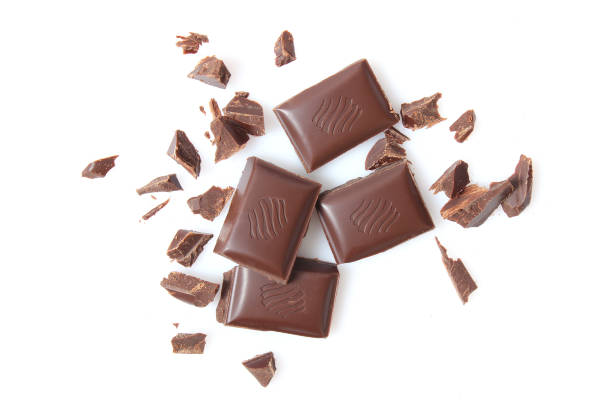 istock pieces of chocolate isolated on white. 1314039291