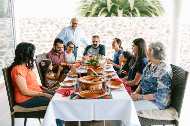 istock Multi-generation family eating together outdoors 1314040957