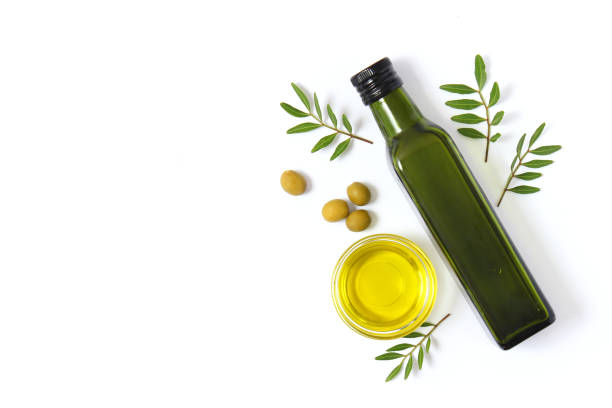 istock olive oil in a bottle on a white background top view. 1314041846