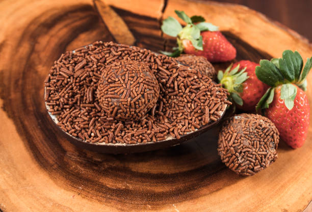 istock Chocolate Easter Egg filled with brigadeiro (brigadier) and strawberries 1314041977