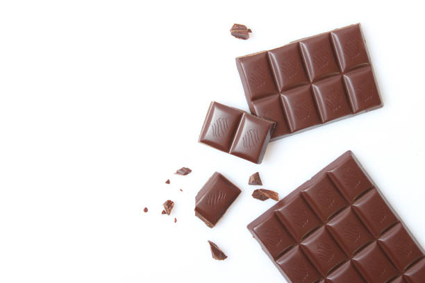 istock pieces of chocolate isolated on white. 1314042720