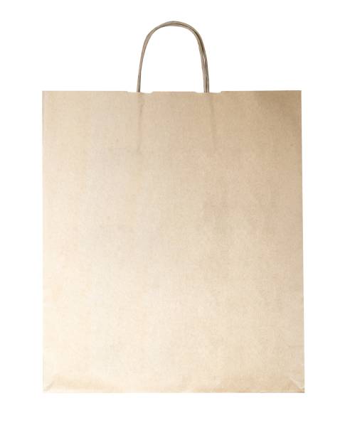 istock Kraft paper bag on dark wooden background 1314043514