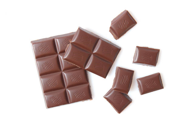istock pieces of chocolate isolated on white. 1314043659