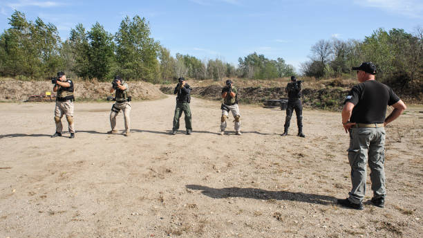 istock Army soldiers in action tactical combat shooting from machine gun 1314044272