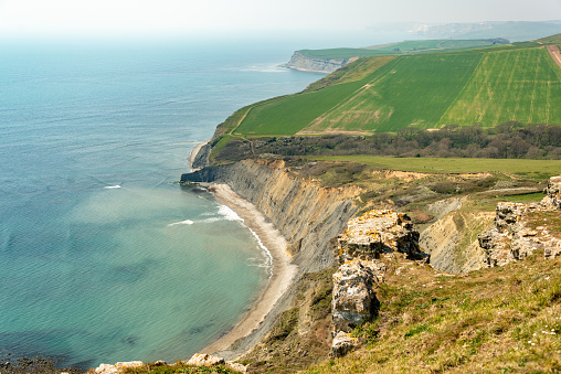 Fields lead to the sea in Dorset on the Jurassic Coast.