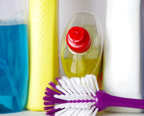 istock Cleaning agent with purple brush 1314046733